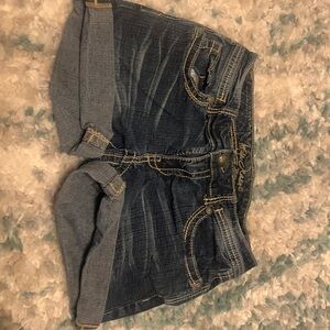 Ariya Jeans. Dark Wash Button closure Jean Short. Size: 7/8.